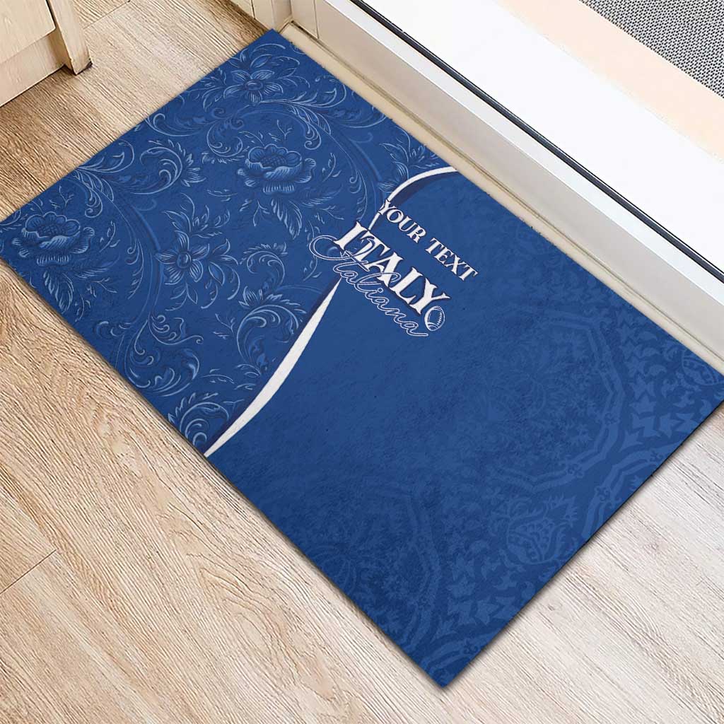 Blue rubber doormat with floral scroll design and ITALY personalized text in center