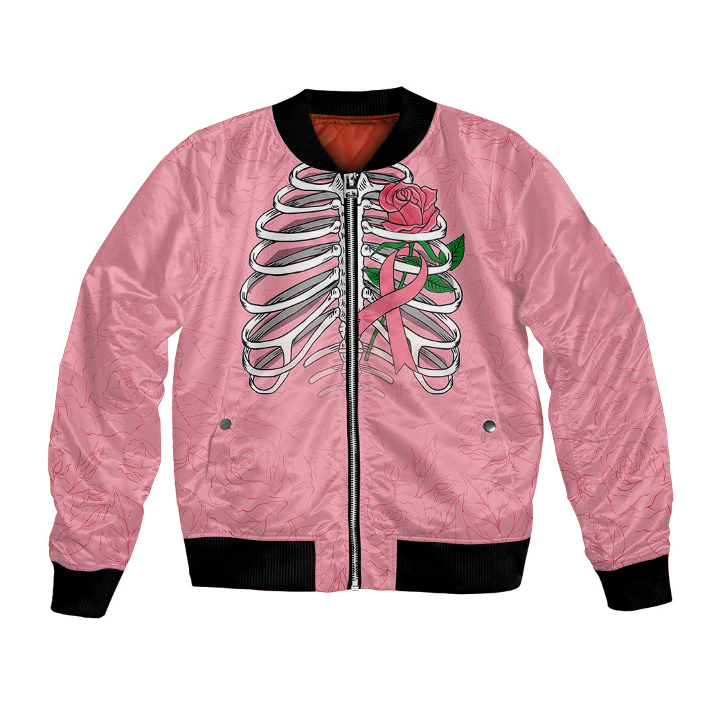 Pink bomber jacket with front zipper, ribbed hem, skull and rose skeleton graphic