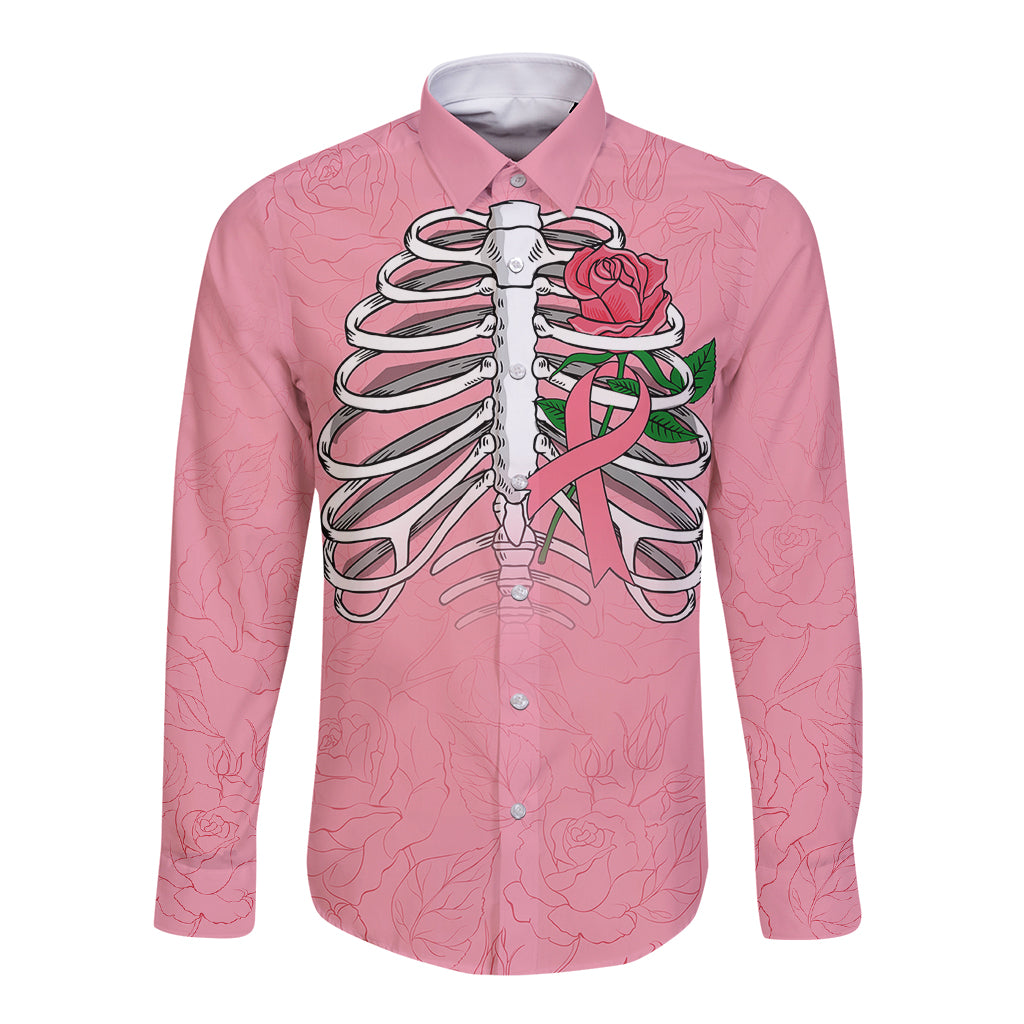 Pink long-sleeve button shirt with skull and roses graphic, front view