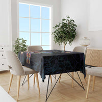 Dark navy tablecloth with multicolor butterfly print, draped over dining table