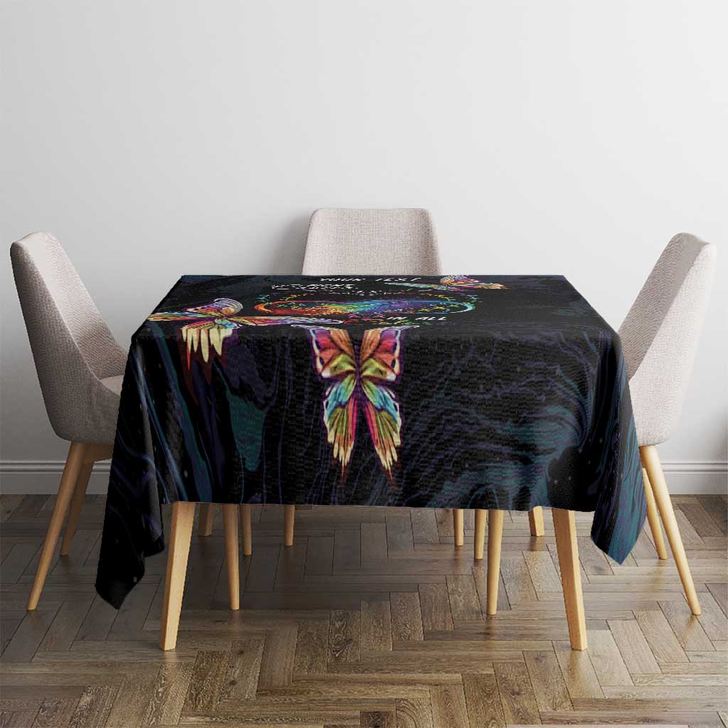 Dark navy tablecloth with central multicolor butterfly print on square dining table