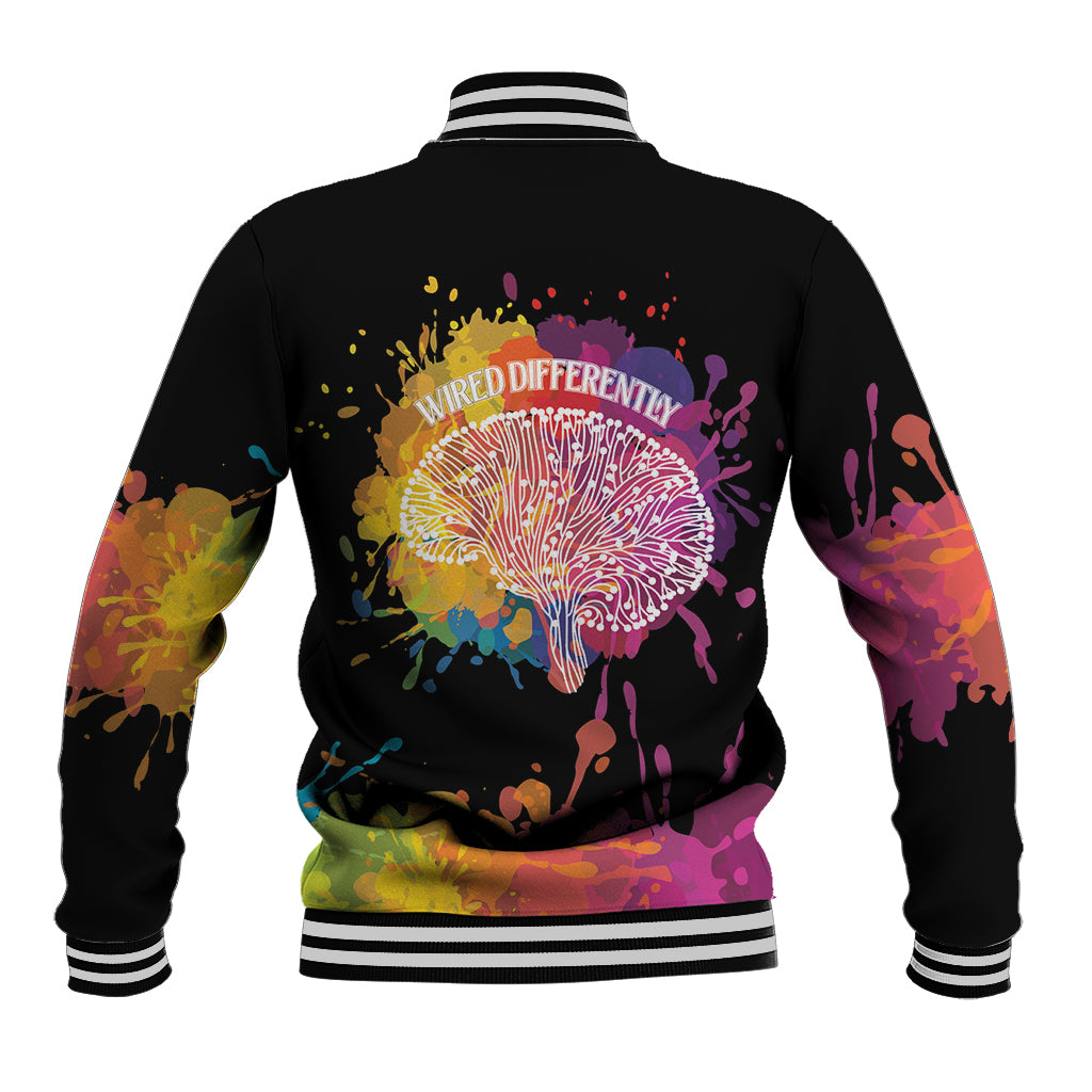 Black unisex baseball jacket, back text 'WIRED DIFFERENTLY' with colorful splash dandelion.