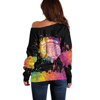 Black off-shoulder sweater, back view, colorful splash graphic with text
