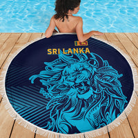 Round Sri Lanka beach blanket with blue lion artwork, navy background, white fringe trim