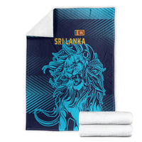 Folded navy blanket with blue lion design and Sri Lanka lettering
