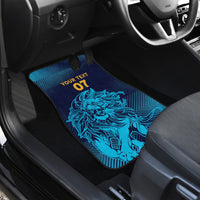 Blue rear car floor mat with lion design and 'Your Text 07' in the back seat.