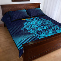 Navy quilt bed set with teal lion artwork on striped gradient and matching pillows