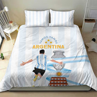 White bedding set featuring light blue stripes and Argentina artwork on the comforter