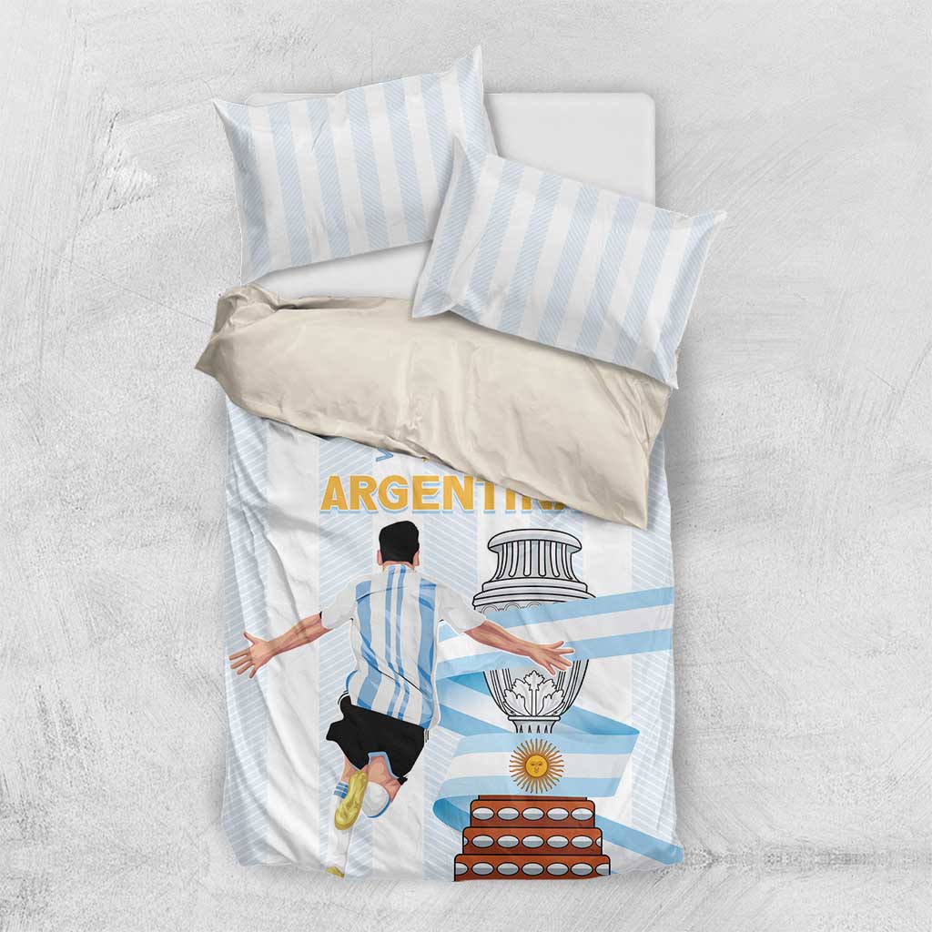White and light blue striped comforter with Argentina-themed emblem graphic