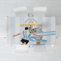 White tablecloth with light blue stripes and Argentina-themed central print