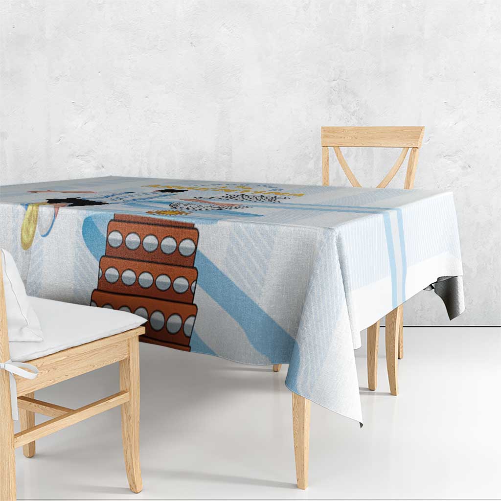 White tablecloth with light blue stripe pattern and colorful Argentina-style graphic