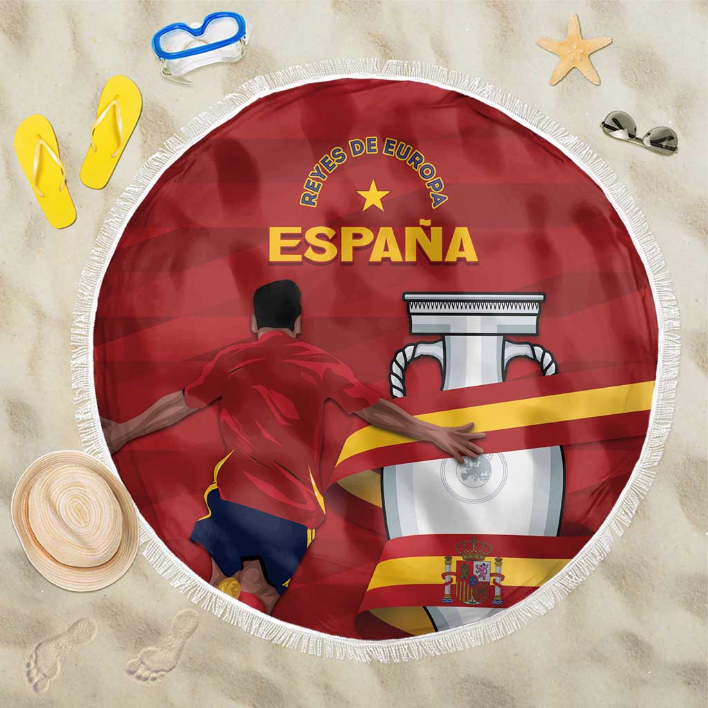 Round red beach blanket with fringed edge and Spain Campeones de Europa graphic