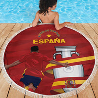 Round red Spain beach blanket with fringe, Spain text, trophy graphic, and soccer player.