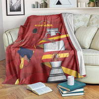 Spain blanket with red design, player graphic, and trophy illustration