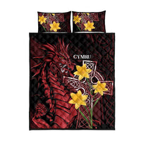 Quilt bed set, flat view: black and red dragon with Celtic cross and yellow motifs