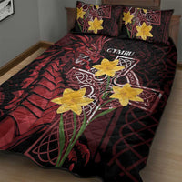 Quilt bed set on bed: black and red dragon art with yellow flowers and Celtic cross