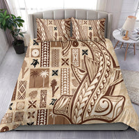 Beige tapa-pattern bedding set with matching pillowcases on a made bed