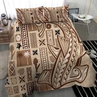 Beige tapa-pattern duvet with brown tribal motifs and swirled designs