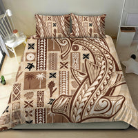 Beige and brown tapa-pattern bedding set with decorative pillow and full duvet