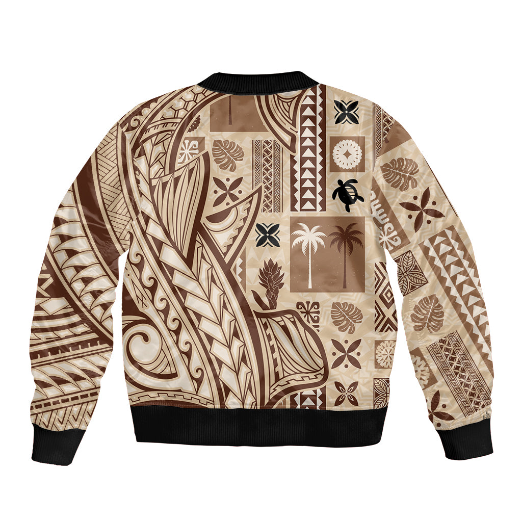 Beige bomber jacket back with tribal tapa patchwork pattern, ribbed hem and collar