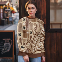 Beige tapa-pattern crewneck sweater on model, long sleeves, brown rib trim