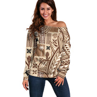 Beige off-shoulder sweater with long sleeves and Polynesian tapa mix patterns