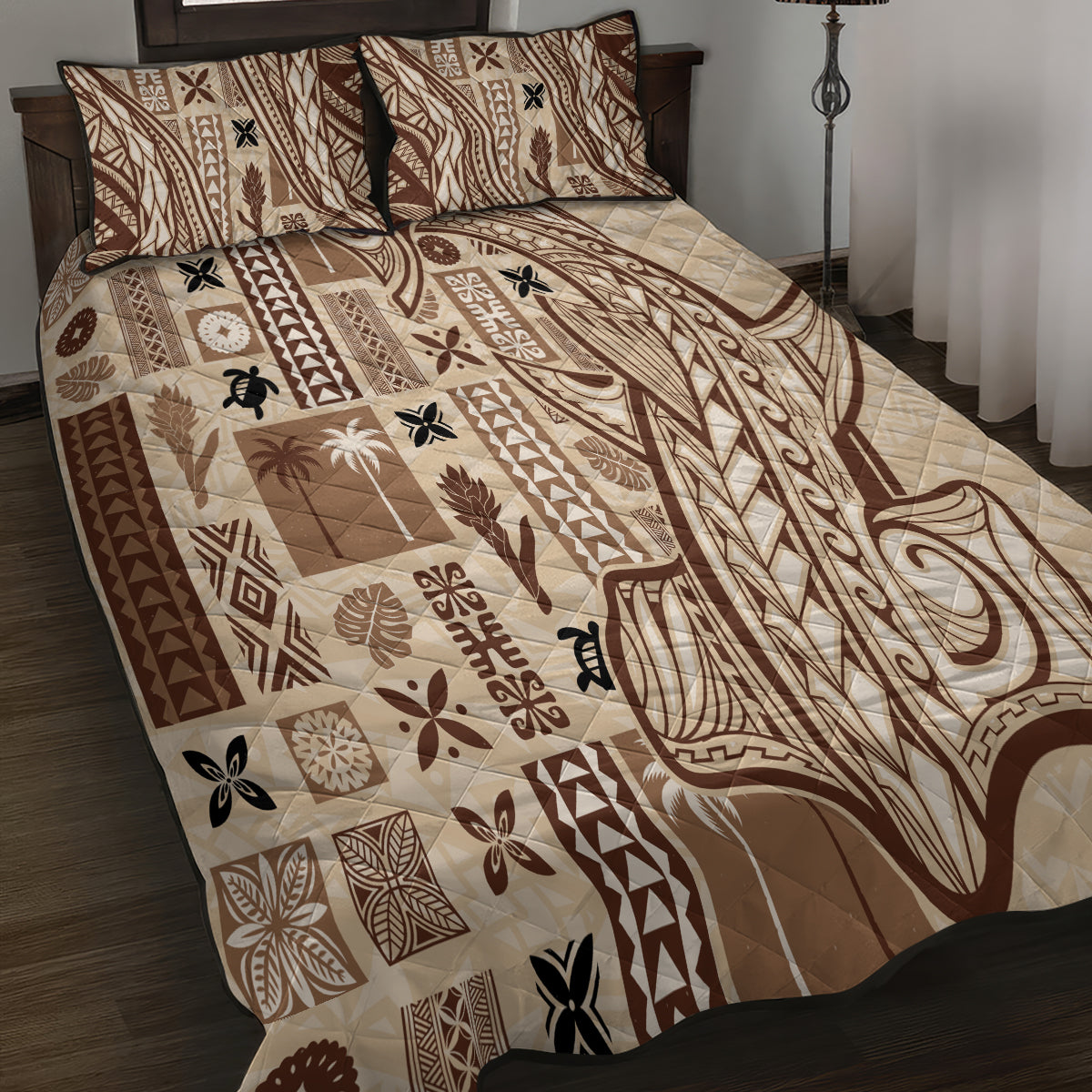 Beige tapa-pattern quilt with dark-edged pillow shams, brown and black motifs