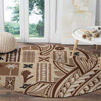 Round tapa carpet with large leaf and tribal stripe motifs in brown and beige
