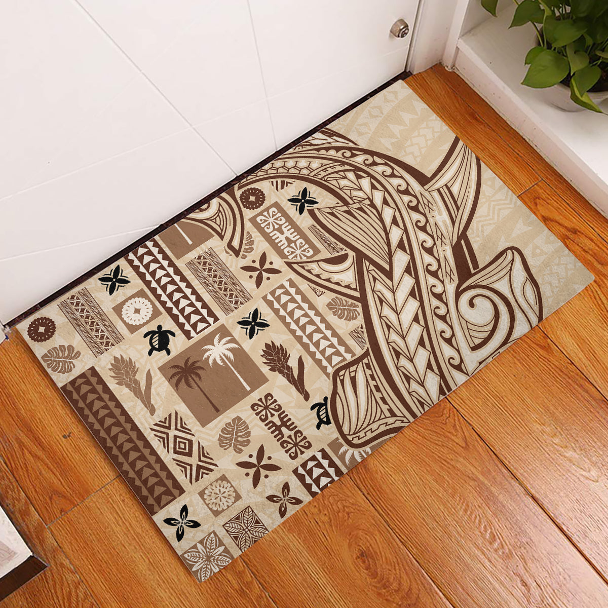 Beige brown patterned rubber doormat with Tapa-inspired motifs and leaf elements