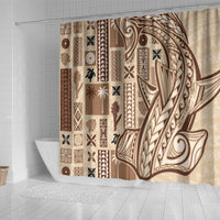 Beige shower curtain featuring brown curved tapa artwork and striped geometric inserts