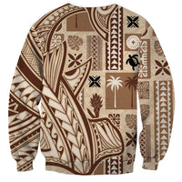 Beige and brown tapa-pattern sweatshirt with allover island symbols and geometric motifs.