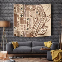 Beige tapa tapestry with brown patterned blocks and a large curving figure design