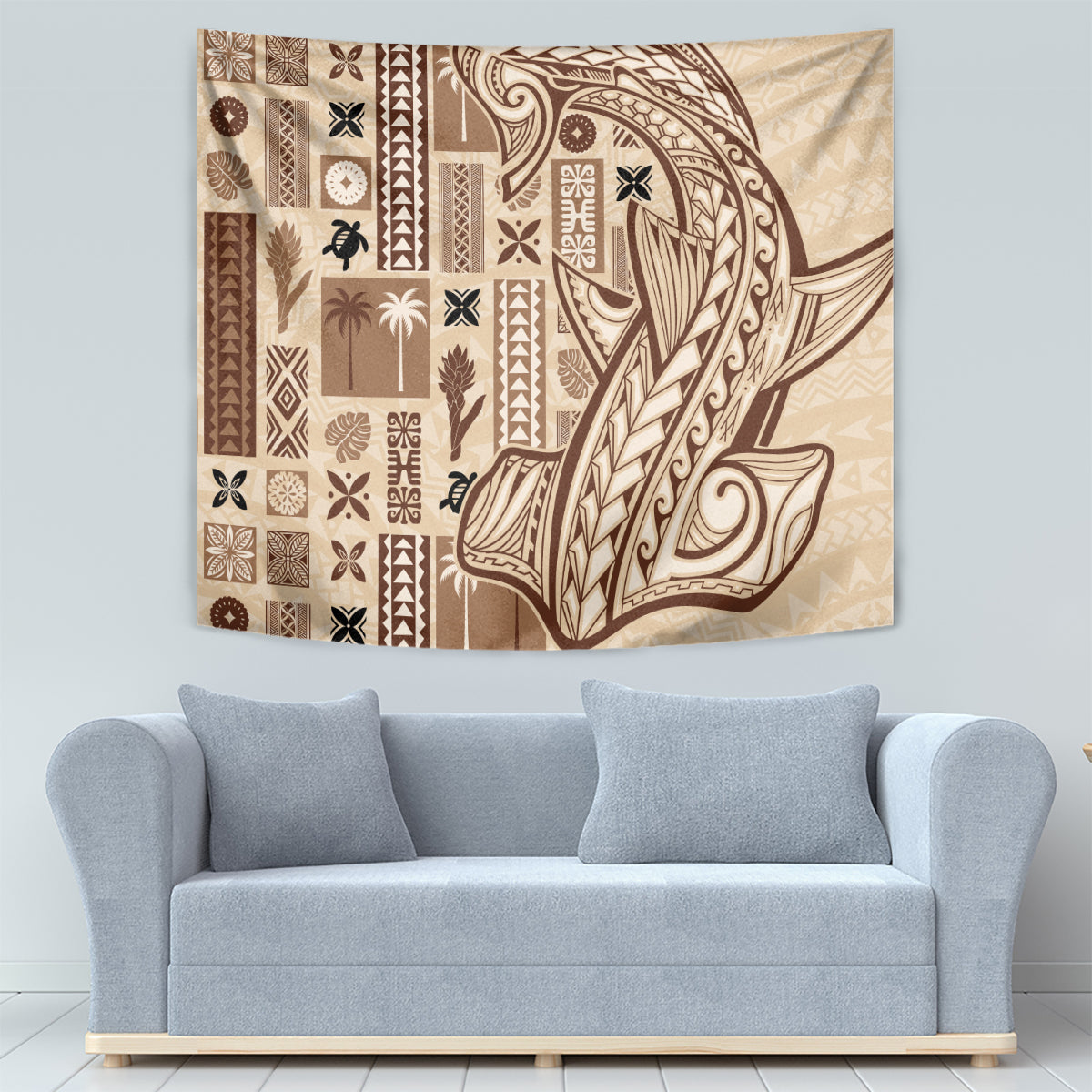 Beige tapa wall hanging with brown ornate curved linework and patchwork panels