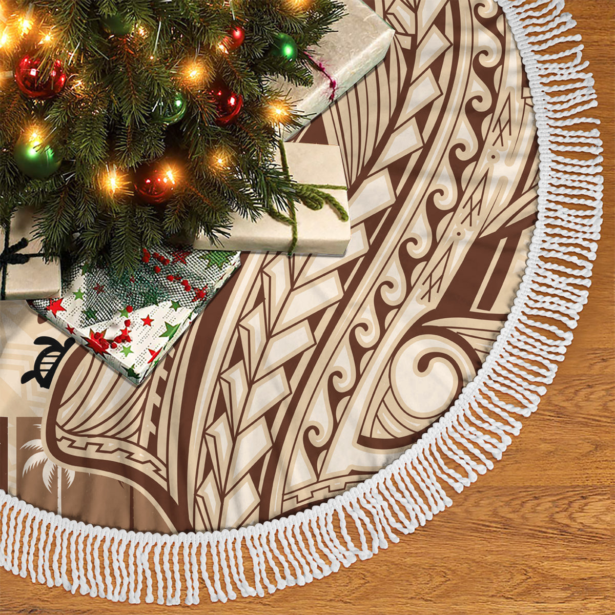 Beige tapa tree skirt with white fringed edge and curved panel of tatau patterns