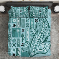Teal tapa-pattern bedding set with geometric prints and leaf motifs on comforter
