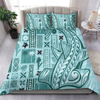 Teal tapa-pattern comforter bedding set with leaf, tiki, and geometric block prints