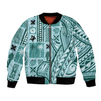 Unisex teal bomber jacket with front zipper and ribbed black collar, cuffs, tiki pattern