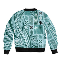 Unisex teal bomber jacket back view with ribbed black trim and intricate tiki tapa pattern