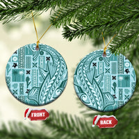 Teal circular ceramic ornament with Polynesian tapa pattern, gold hanging loop