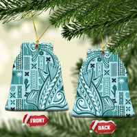 Teal bell-shaped ceramic ornament with tapa patterns, gold hanging loop
