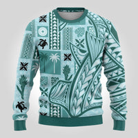 Teal crewneck ugly Christmas sweater with long sleeves, ribbed cuffs, tribal panel pattern