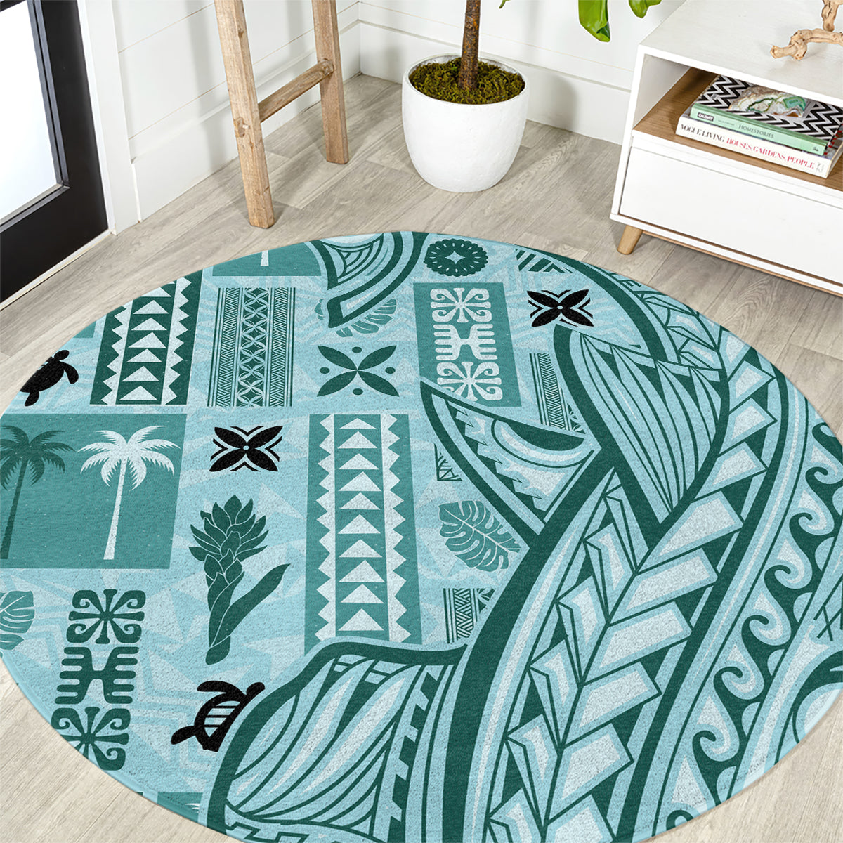 Round teal tapa-pattern carpet with floral, leaf, and geometric motifs