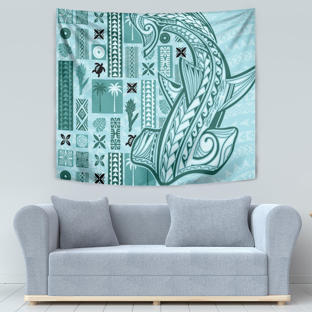 Teal tapa tapestry with geometric borders and stylized greenery patterns