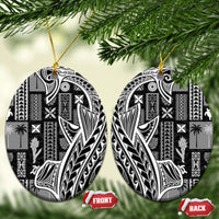 Oval black and white tapa ceramic ornaments with gold hanging strings