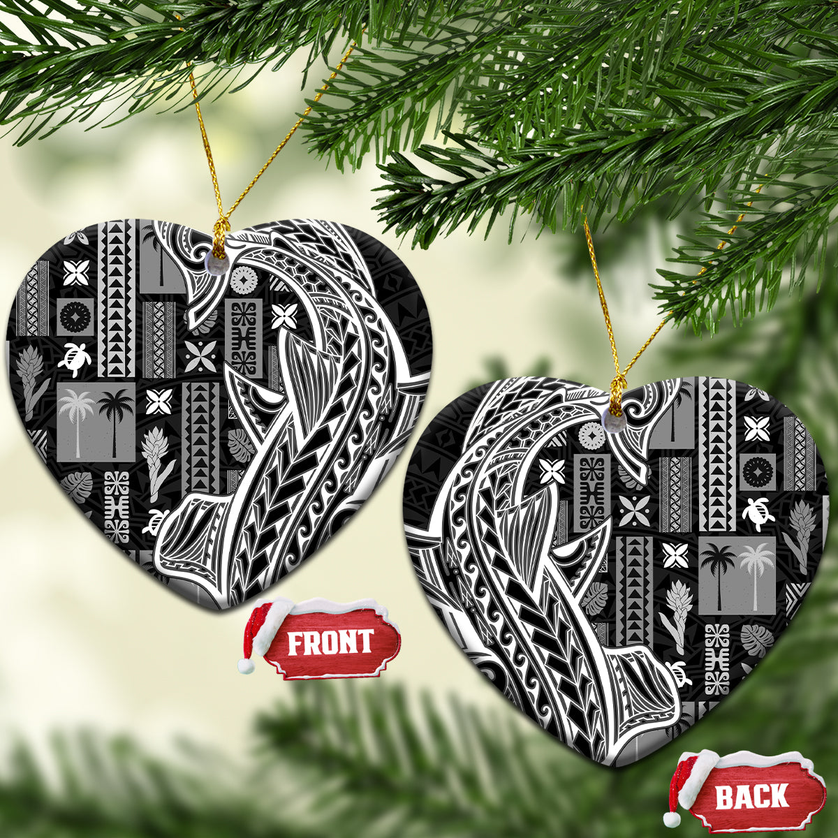 Heart-shaped black and white tapa ceramic ornaments with gold hanging strings