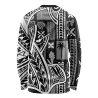 Unisex long-sleeve tapa shirt, black with black-and-white geometric and leaf patterns (back)