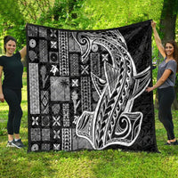 Black Samoa tapa quilt with bold Tatau-style face motif and patchwork tiki icon blocks