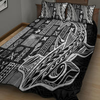 Black and gray tapa quilt bed set with swirling tribal motif and two pillows