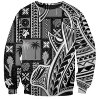 Black unisex sweatshirt with bold monochrome tapa siapo patchwork patterns