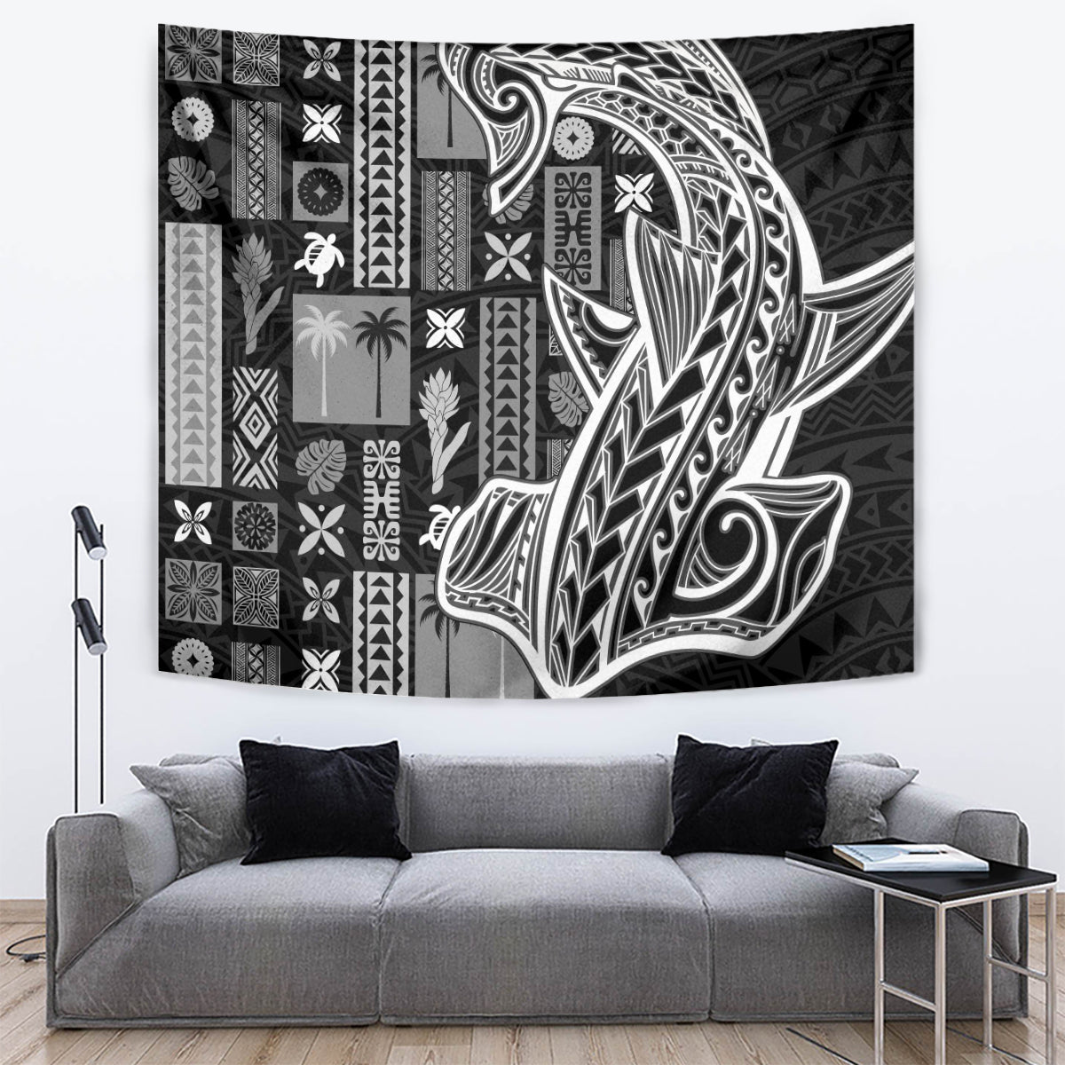 Rectangular black and white Polynesian tapa tapestry with large stylized figure, wall-mounted.